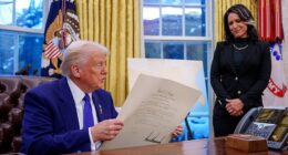 President Donald Trump signs Tulsi Gabbard's commission for her new role as Director of National Intelligence