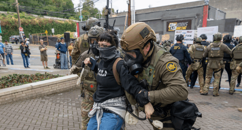 ICE agents detaining individual