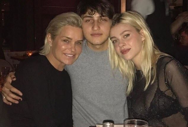 Yolanda Hadid, pictured with her son Anwar and his then-girlfriend Nicola Peltz, is said to have reached out to David and Victoria Beckham amid their family feud