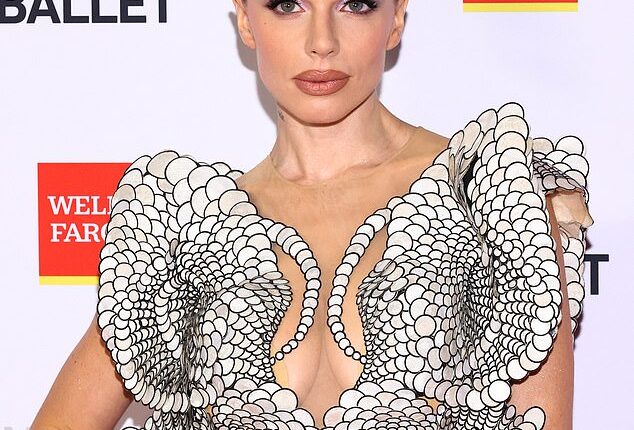 Julia Fox's cluttered New York City apartment left little to be desired after she gave fans a tour. She's seen in October