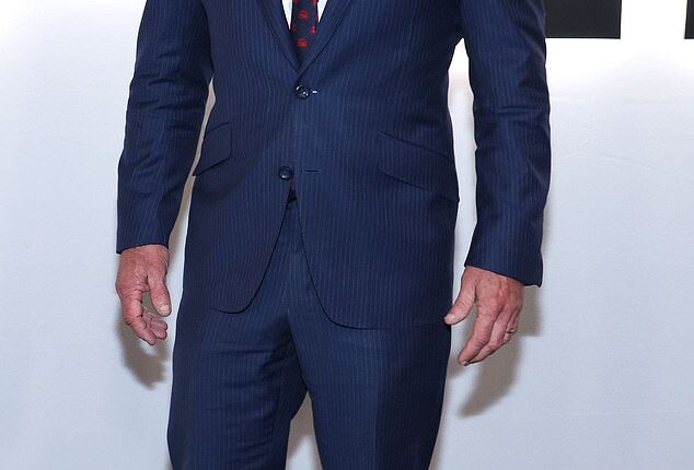 Color clash! United States Secretary of Health and Human Services Robert F. Kennedy Jr. looked a bit mismatched as he sported a navy blue pinstripe suit. He paired it with shiny black dress shoes that seemed to clash, along with a white button-down shirt and red printed tie