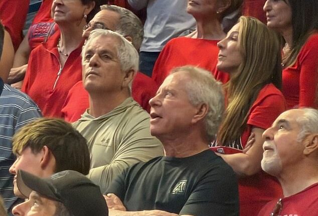 Pima County Sheriff Chris Nanos took time off the ongoing search for Nancy Guthrie to enjoy a basketball game on Saturday afternoon, exclusive Daily Mail images show