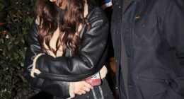 Zac Efron sparked rumors he's dating America's Got Talent alum Angelina Green after they attended the Raising Cane's pre-Super Bowl LX party together in San Francisco, CA on Saturday night