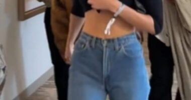 Not in the Super Bowl spirit! Kendall Jenner arrived to the big game in a black crop top that showed off her entire midsection. She completed her look with a pair of high-waisted blue jeans and black sunglasses
