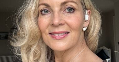 Alice Smellie with her Sona – a vagus nerve-stimulating earpiece – which she believes has given her a calmer outlook