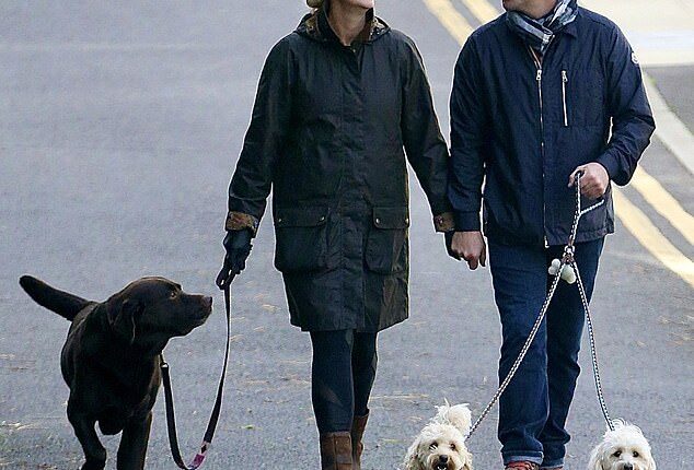 Ant McPartlin and his wife Anne-Marie Corbett walking Hurley and their two maltipoos