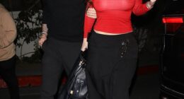 Bella Thorne made a bold fashion statement on Sunday night as she arrived at a Grammys after-party in Hollywood, stepping out bra-free beneath a sheer, ribbed red top
