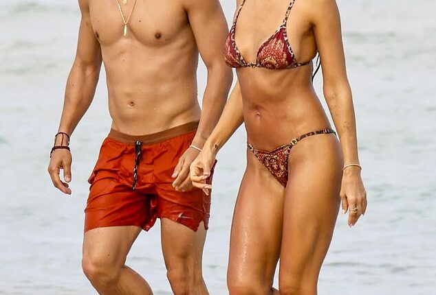 Jessica Alba celebrated the end of her 16-year marriage by parading her new rebound romance with toyboy Danny Ramirez in Miami Beach, FL on Monday