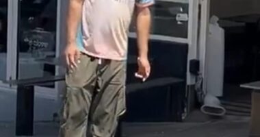 A worker from The Grumpy Baker (above) was filmed pouring cooking oil down a storm drain
