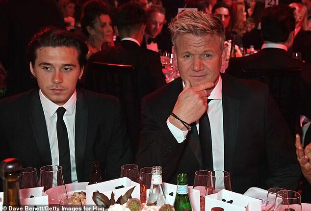 Brooklyn Beckham has unfollowed his father's best friend Gordon Ramsay on Instagram after the chef called for him to 'remember where he came from' amid his feud with his parents