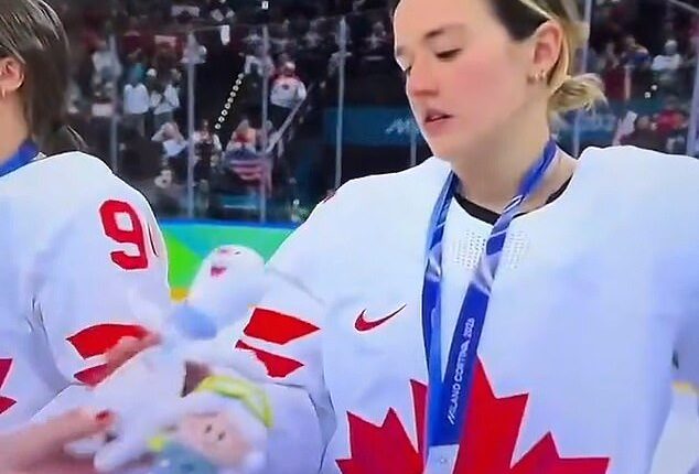 Canada's Daryl Watts looked particularly annoyed to receive Tina. The Toronto native was seen staring down at the stuffed toy before sighing and staring off into the crowd