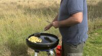 Deryck Latimer an avid caravan camper with his Cadac cooker.