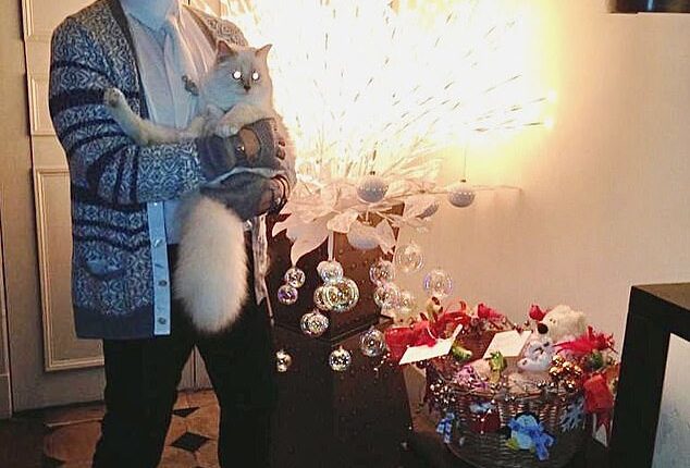 Karl Lagerfeld's cat Choupette (pictured together in 2016) was left $1.5million by the late designer who passed away in 2019 at the age of 85