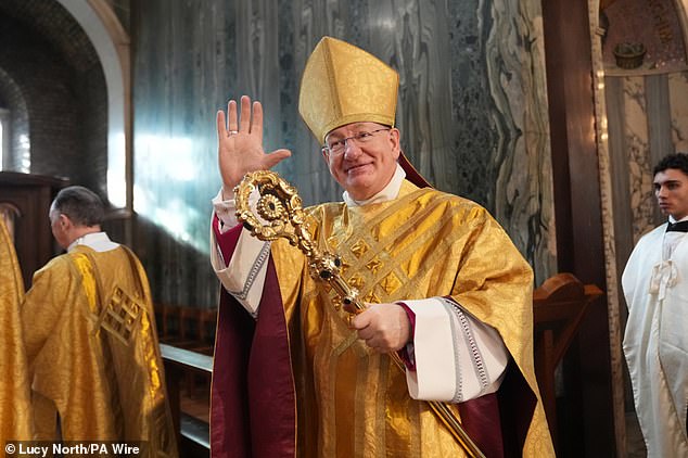 Bishop Richard Moth (pictured at the installation Mass) was officially made 12th Archbishop of Westminster in front of a 2,000-strong congregation at Westminster Cathedral in central London on Saturday