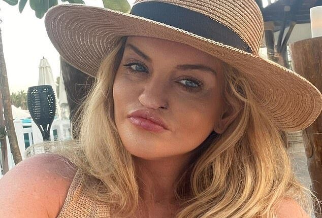 Danniella Westbrook showed off her new face in a glamorous selfie as she revealed she had 'three more nose operations to go'