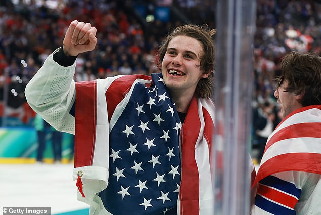 Jack Hughes celebrates after scoring the goal that secured Team USA gold against Canada