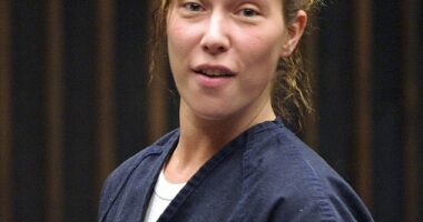 Eminem's ex-wife Kimberly Scott appeared out of sorts as she was seen in newly-released bodycam footage from her arrest in connection with a DUI earlier this month in her native Michigan. Pictured in Michigan in 2004