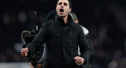 Mikel Arteta celebrates in front of the away fans at the final whistle on Sunday