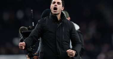 Mikel Arteta celebrates in front of the away fans at the final whistle on Sunday