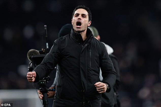 Mikel Arteta celebrates in front of the away fans at the final whistle on Sunday