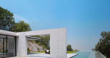 Explore the world's five most beautiful swimming pools, from a divisive red-tiled design to a historic rooftop venue in Bath