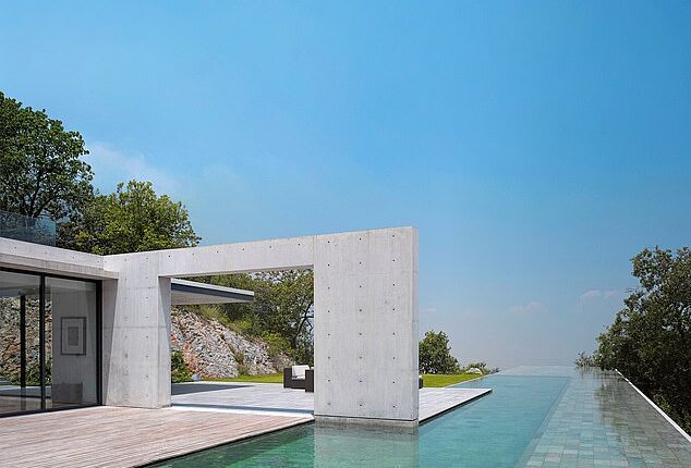 Explore the world's five most beautiful swimming pools, from a divisive red-tiled design to a historic rooftop venue in Bath