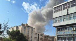 Smoke rises on the skyline after an explosion in Tehran, Iran, in the wake of joint US and Israel strikes