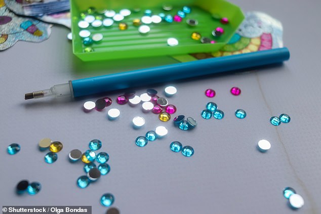 Criminals are working off community sentences by sticking fake diamonds on greeting cards, Justice Secretary Angela Constance has been told