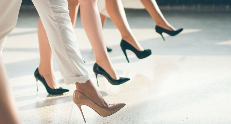 women walking in heels