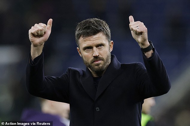 Gary Neville believes Michael Carrick (centre) shouldn't be given the full-time Man United job