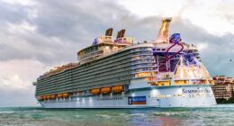 Five men were arrested in Miami last week after trying to board the Royal Caribbean Symphony of the Seas (pictured) for a cruise marketed as 'The World’s Biggest Gay Festival at Sea'