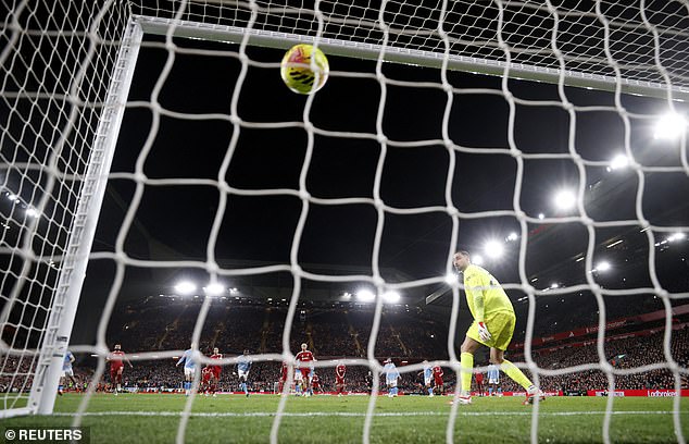 Manchester City's Gianluigi Donnarumma barely moves as Dominik Szoboszlai's free-kick swerves into the net but does the Puma ball, brought in for this season, swerve more?