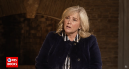 Attorney General Alliance's Karen White giving an interview.