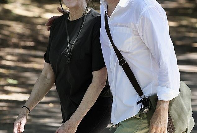 Tom Hanks and wife Rita Wilson put on their walking gear for a low-key stroll around Shark Beach and along the scenic Hermitage Foreshore walking track on Saturday