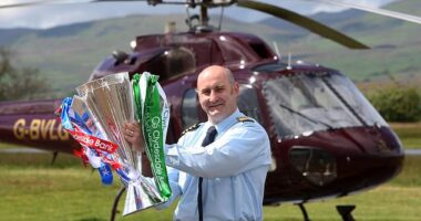 Pilot David Young prepares to deliver the Premiership trophy back in 2009 season but will a helicopter be needed on the final day of this season?