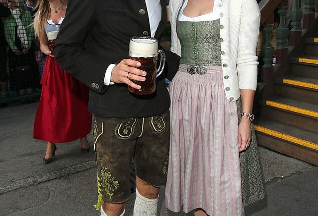 Thomas Muller's wife Lisa (right) has claimed she no longer cares what people think of her