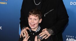 Jelly Roll looked happy at Friday¿s premiere of the animated movie Goat where he had his adorable nine-year-old son, Noah, for backup