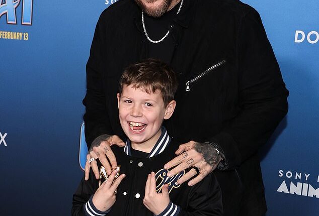 Jelly Roll looked happy at Friday¿s premiere of the animated movie Goat where he had his adorable nine-year-old son, Noah, for backup