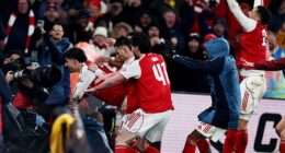 Arsenal rushed onto the pitch in their number to celebrate their spot in the Carabao Cup final
