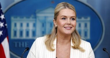 White House press secretary Karoline Leavitt is photographed at a press briefing on Tuesday. This month she's twice shared criticism of Bad Bunny, but she sampled his most popular song in her New Year's Eve Instagram post