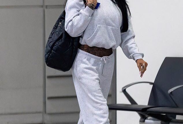 Katie Price, 47, was seen at the airport on Friday as she prepared to fly out to Dubai for her honeymoon with husband Lee Andrews