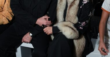 Kim Cattrall and her new husband Russell Thomas made their first public appearance since secretly tying the knot as they attended Conner Ives' LFW show at Claridge's Hotel on Monday