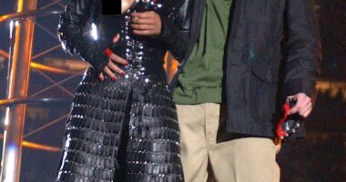 Kim Kardashian and Lewis Hamilton take their 'secret romance' public at Super Bowl 2026 as lip reader reveals what he told her about meeting his mom