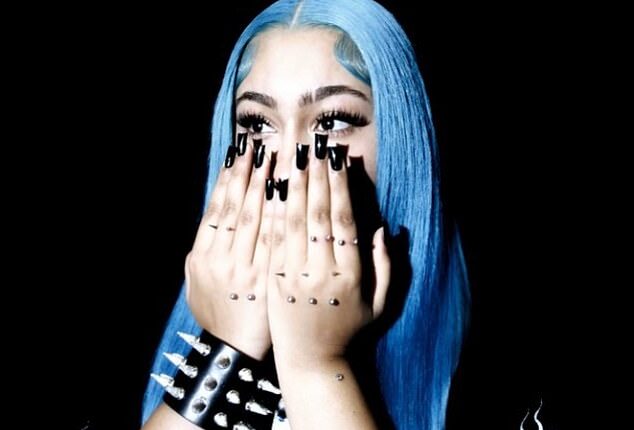 North West took to Instagram this week to reveal even more apparent body modifications after previously being criticized – and she surprised her fans by releasing a new song called PIERCING ON MY HAND on Friday; pictured in the single artwork