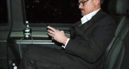 Leonardo DiCaprio showed off a new look and sported reading glasses while leaving the BAFTAs after losing the leading actor award