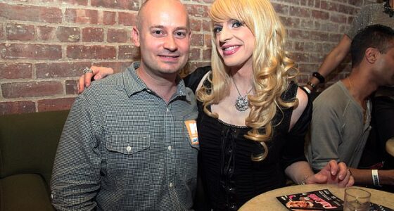 Communications executive Jason Shumaker (L), who played key roles at MTV and VH1 early in his career, died at 55 on February 16 from complications of acute myeloid leukemia, according to Deadline; pictured in 2010 in NYC with RuPaul's Drag Race star Pandora Boxx