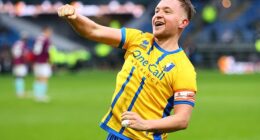 Louis Reed celebrates scoring for Mansfield Town in their brilliant FA Cup upset
