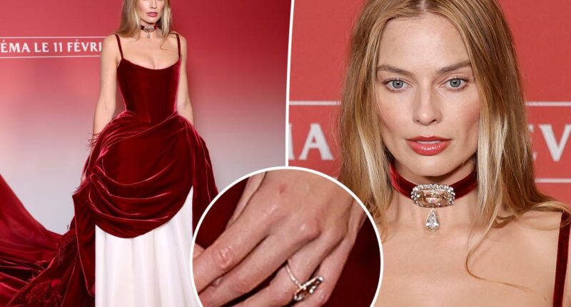 Margot Robbie dazzles in over 100 carats of champagne diamonds at 'Wuthering Heights' Paris premiere
