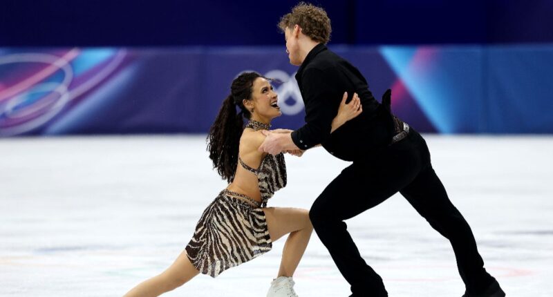 Married Couple's Medal Draws Controversy