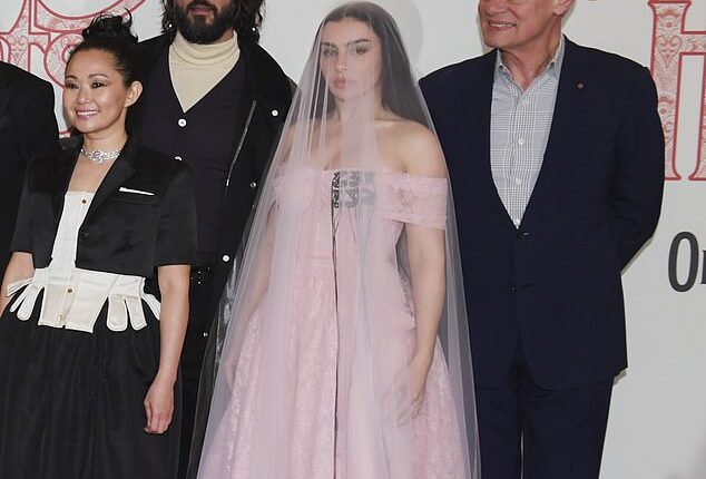 Martin Clunesmade the most of his chance to mingle with the A-Listers as he attended the glitzy UK premiere of his film Wuthering Heights on Thursday